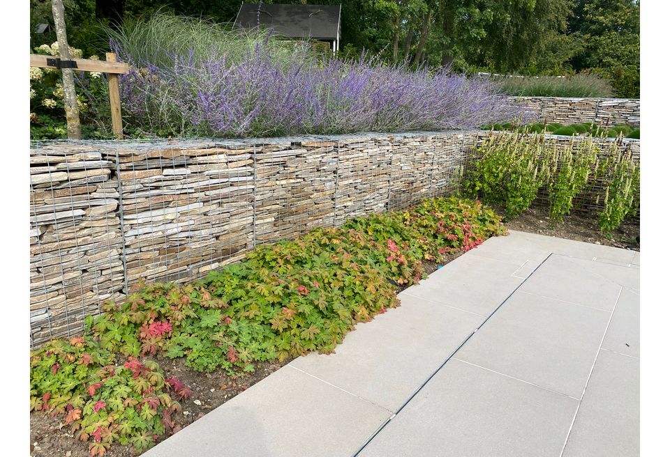 Terraced Pool Garden - The Block planting scheme gives height to different areas of the borders Terraced Pool Garden - The Block planting scheme gives height to different areas of the borders